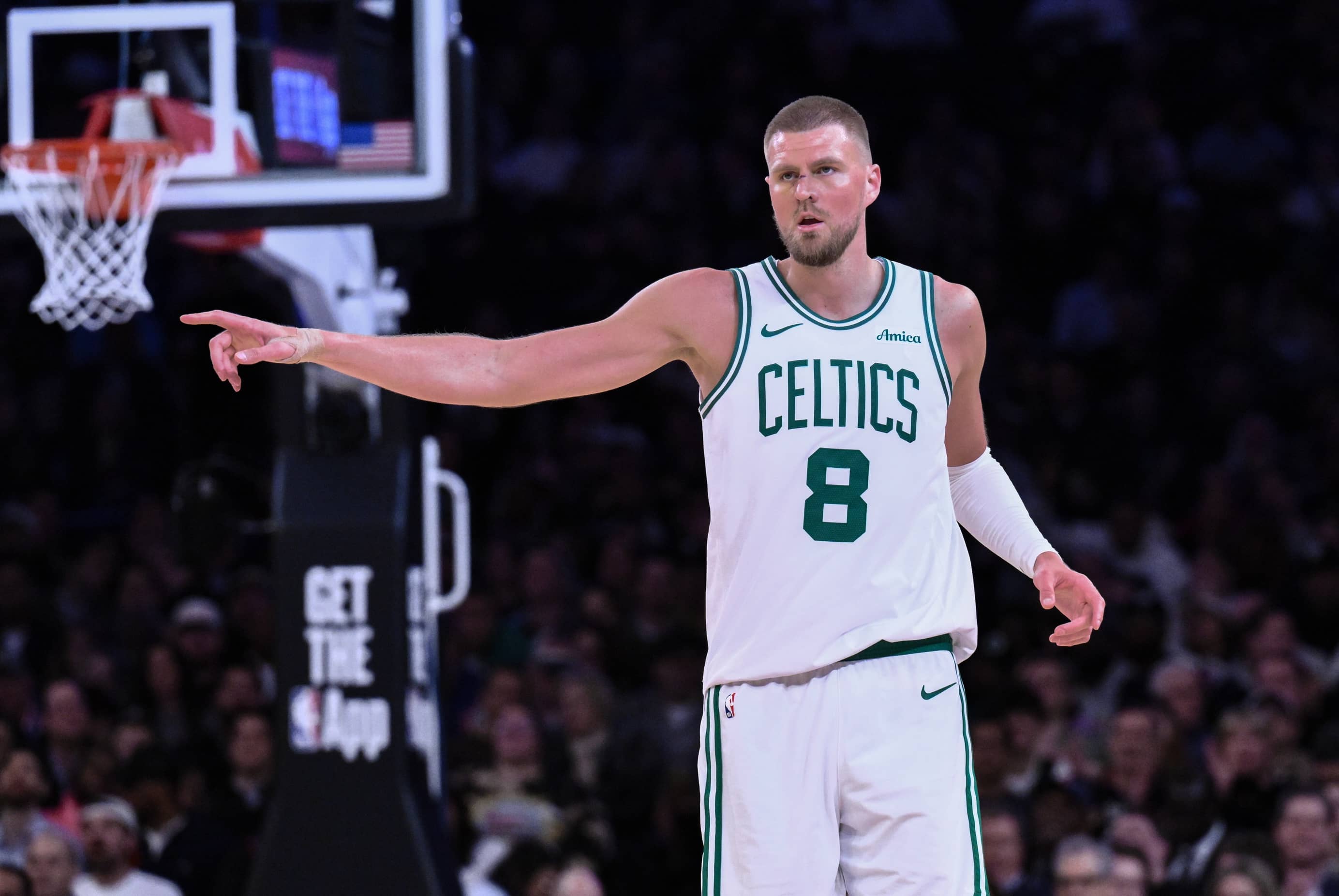 Apr 8, 2025; New York, New York, USA; Boston Celtics center Kristaps Porzingis (8) reacts during the second half against the New York Knicks at Madison Square Garden. Mandatory Credit: John Jones-Imagn Images