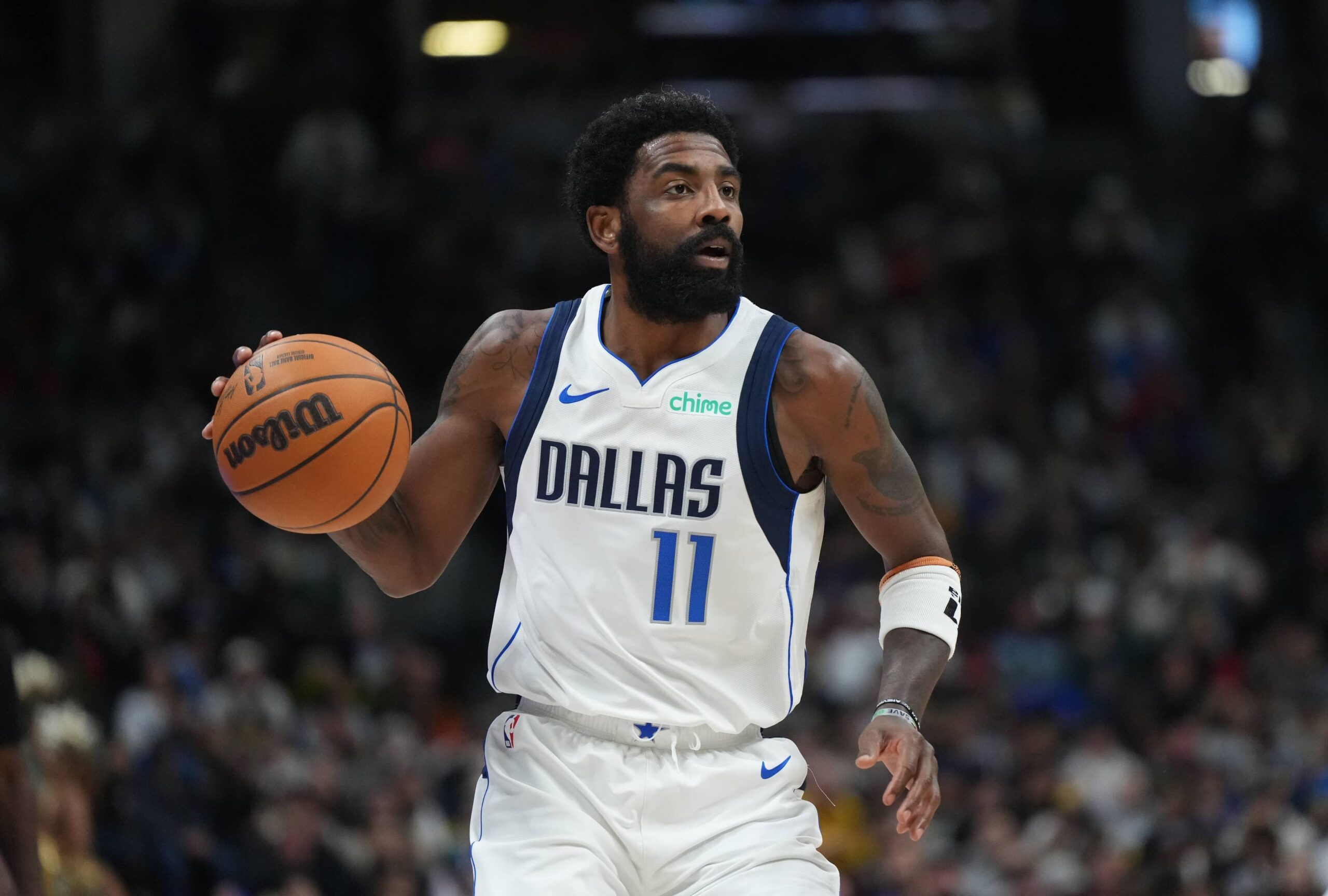 Kyrie Irving in action for the Mavericks against the Nuggets.