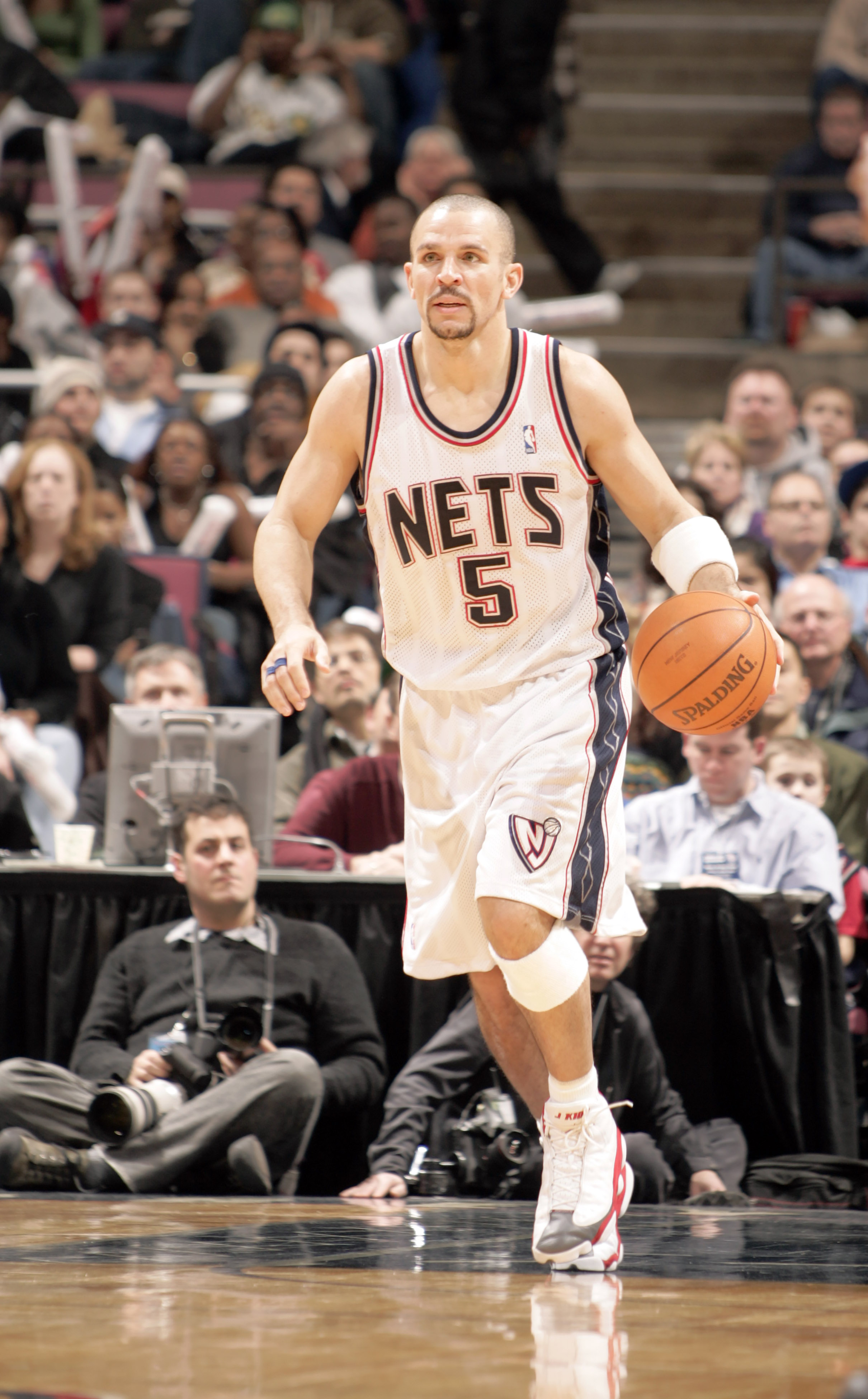 Jan 19, 2005; East Rutherford, NJ, USA; New Jersey Nets guard Jason Kidd (5) with the ball up the court against the Milwaukee Bucks at Continental Airlines Arena. Credit: Lou Capozzola-USA TODAY NETWORK  