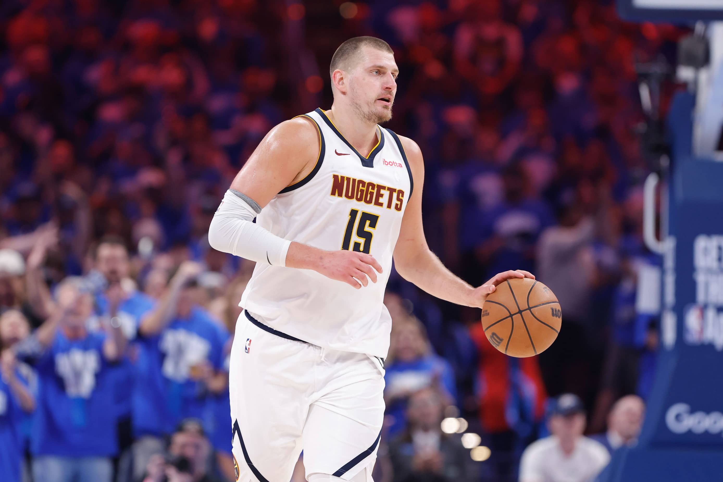 May 18, 2025; Oklahoma City, Oklahoma, USA; Denver Nuggets center Nikola Jokic (15) dribbles down the court against the Oklahoma City Thunder in the second quarter during game seven of the second round for the 2025 NBA Playoffs at Paycom Center. Mandatory Credit: Alonzo Adams-Imagn Images