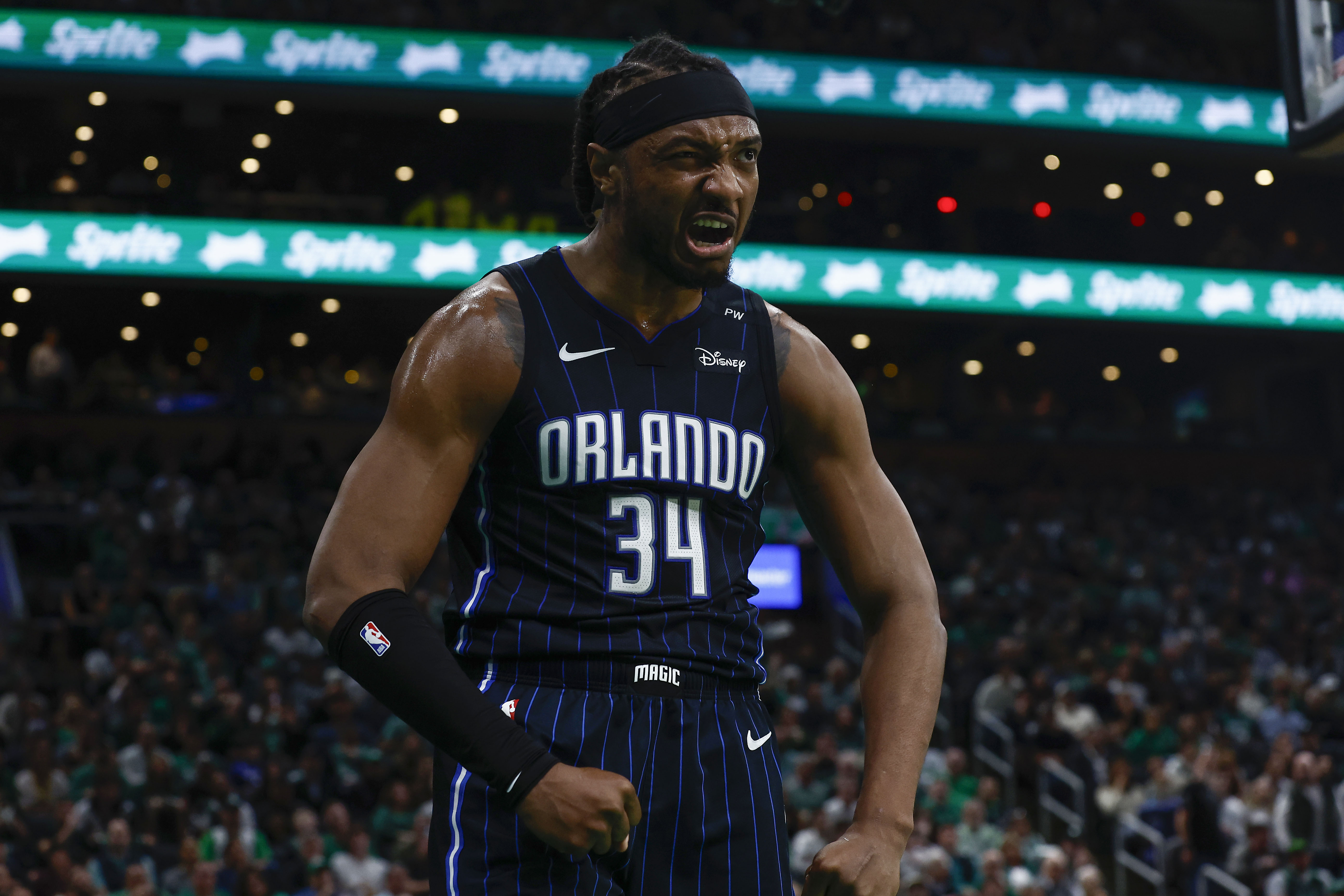 Apr 23, 2025; Boston, Massachusetts, USA; Orlando Magic center Wendell Carter Jr. (34) reacts after making a basket with a foul against the Boston Celtics during the second quarter of game two of the first round of the 2024 NBA Playoffs at TD Garden. Mandatory Credit: Winslow Townson-Imagn Images  