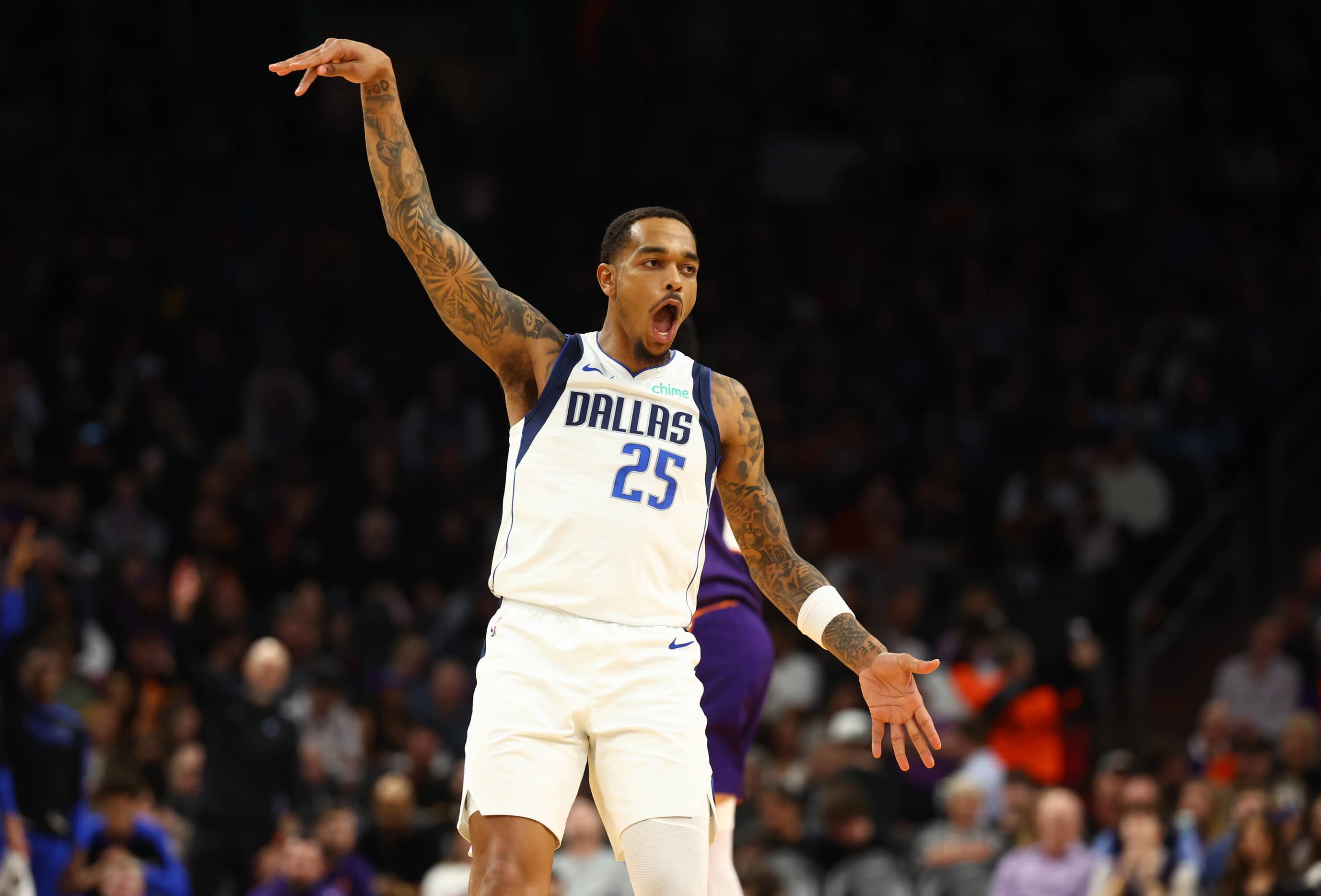Dec 27, 2024; Phoenix, Arizona, USA; Dallas Mavericks forward P.J. Washington (25) reacts as he celebrates a shot against the Phoenix Suns at Footprint Center.