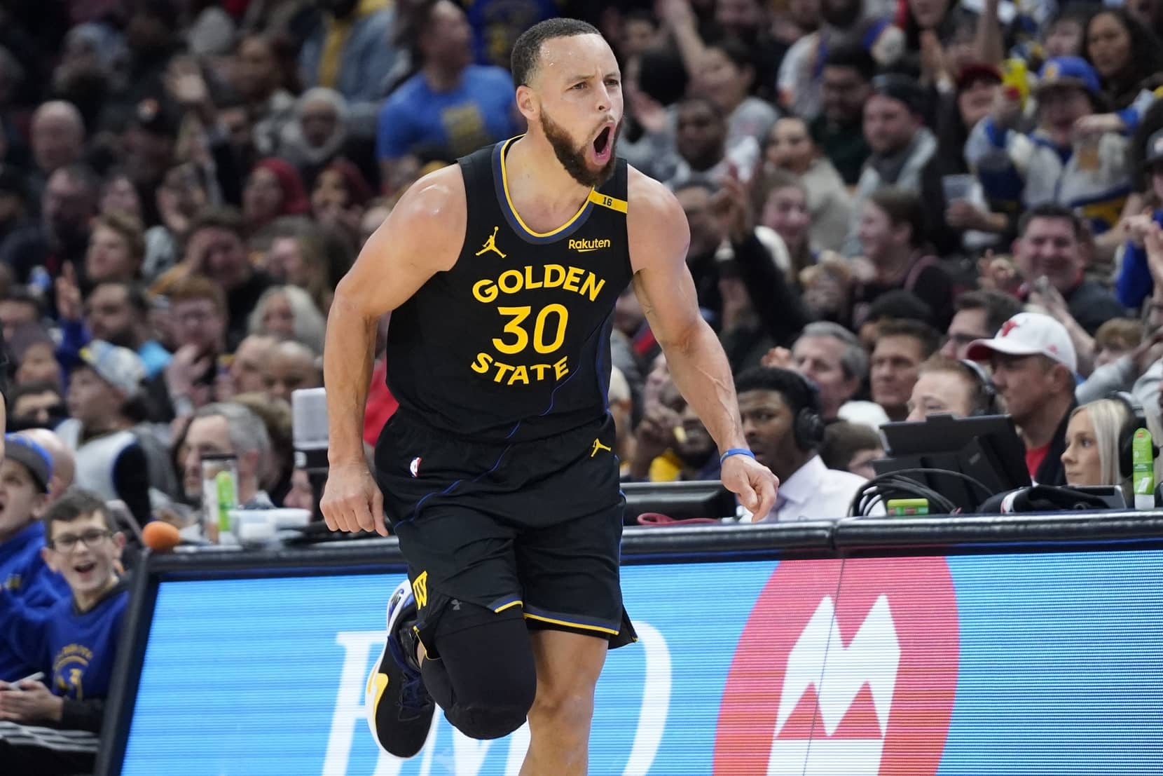 Feb 8, 2025; Chicago, Illinois, USA; Golden State Warriors guard Stephen Curry (30) reacts after making a three-point basket during the second half against the Chicago Bulls at United Center.