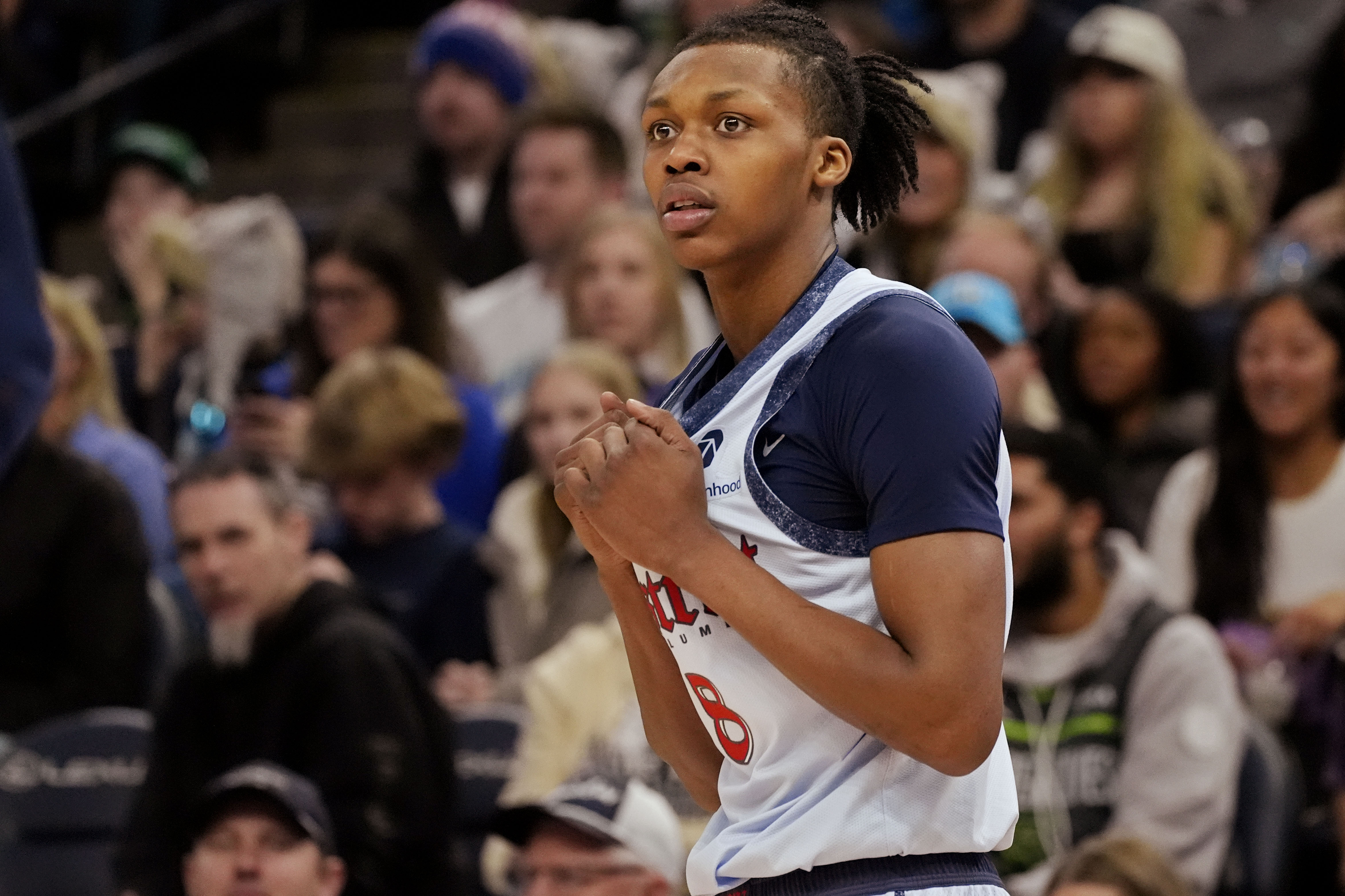 Feb 1, 2025; Minneapolis, Minnesota, USA; Washington Wizards guard Carlton Carrington (8) responds after getting called for a foul while playing the Minnesota Timberwolves in the third quarter at Target Center. Mandatory Credit: Bruce Kluckhohn-Imagn Images