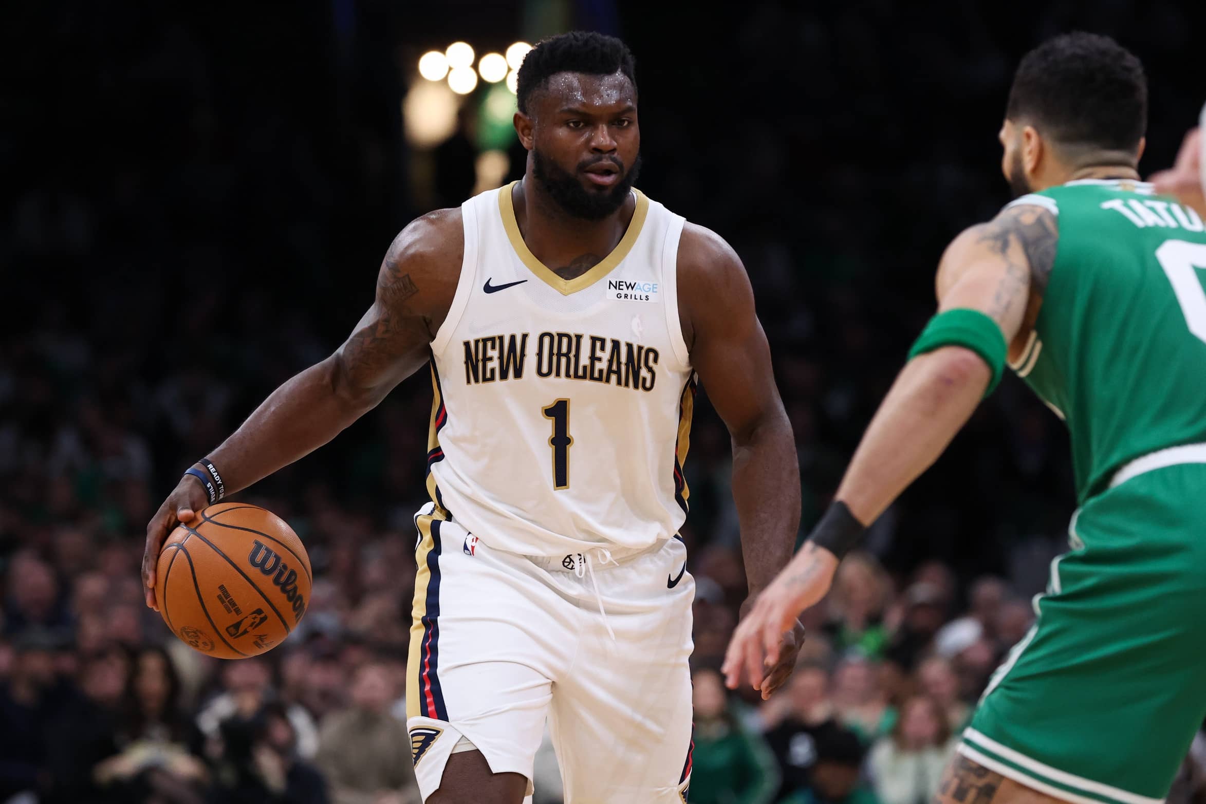 Jan 12, 2025; Boston, Massachusetts, USA; New Orleans Pelicans forward Zion Williamson (1) dribbles down the court during the second half against the Boston Celtics at TD Garden. Mandatory Credit: Paul Rutherford-Imagn Images