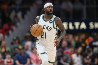 Bucks guard Patrick Beverley dribbles against the Hawks in the second quarter at State Farm Arena