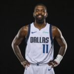 Mavericks guard Kyrie Irving poses for a photo during the Mavericks 2025 media day at the American Airlines Center
