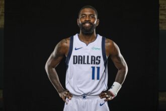 Mavericks guard Kyrie Irving poses for a photo during the Mavericks 2025 media day at the American Airlines Center