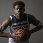 Minneapolis, MN, USA; Minnesota Timberwolves guard Anthony Edwards (5) poses for a photograph as part of media day at Target Center. Mandatory Credit: Bruce Kluckhohn-Imagn Images