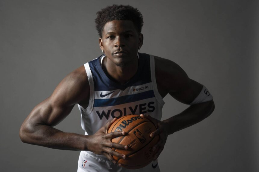 Minneapolis, MN, USA; Minnesota Timberwolves guard Anthony Edwards (5) poses for a photograph as part of media day at Target Center. Mandatory Credit: Bruce Kluckhohn-Imagn Images
