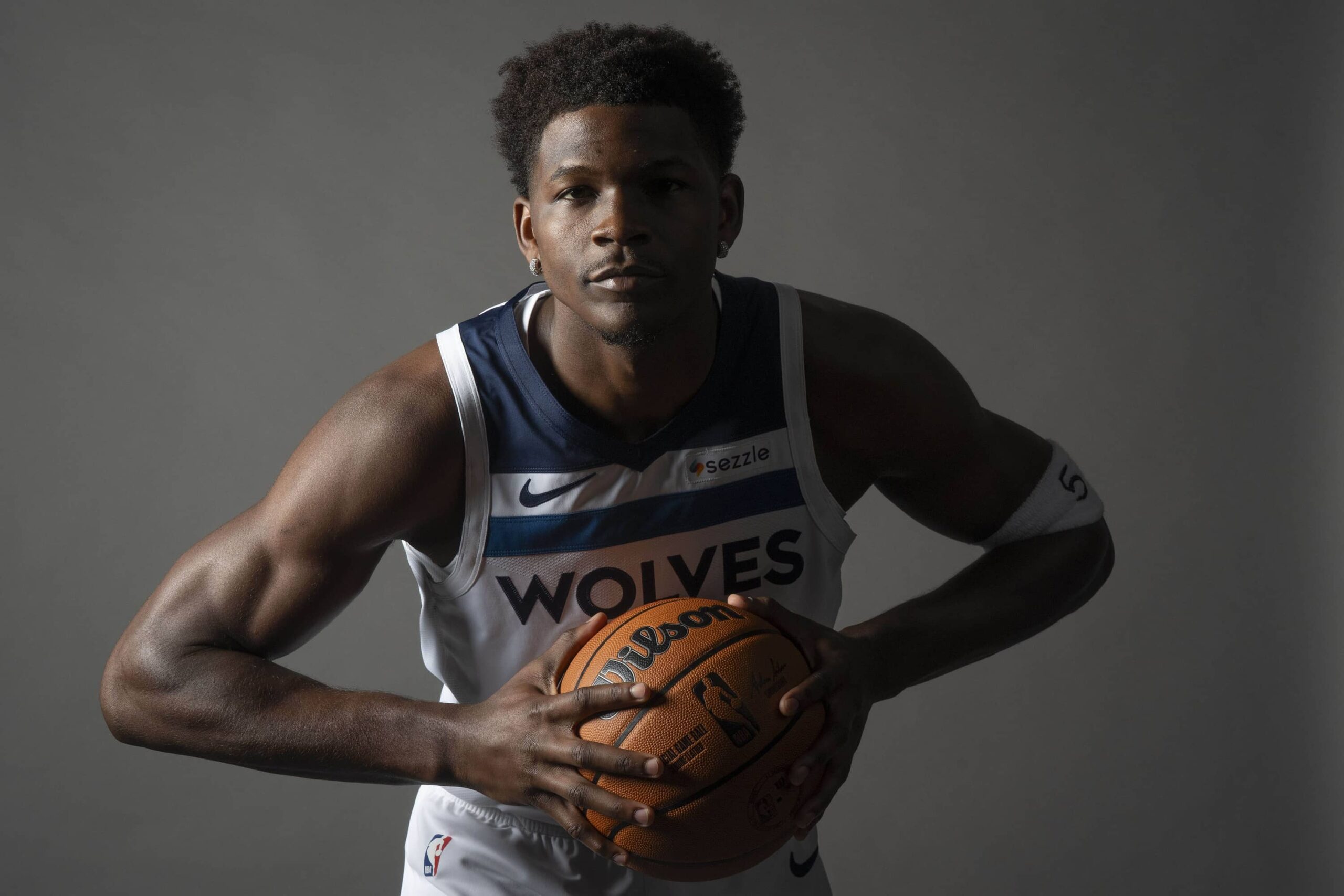 Minneapolis, MN, USA; Minnesota Timberwolves guard Anthony Edwards (5) poses for a photograph as part of media day at Target Center. Mandatory Credit: Bruce Kluckhohn-Imagn Images