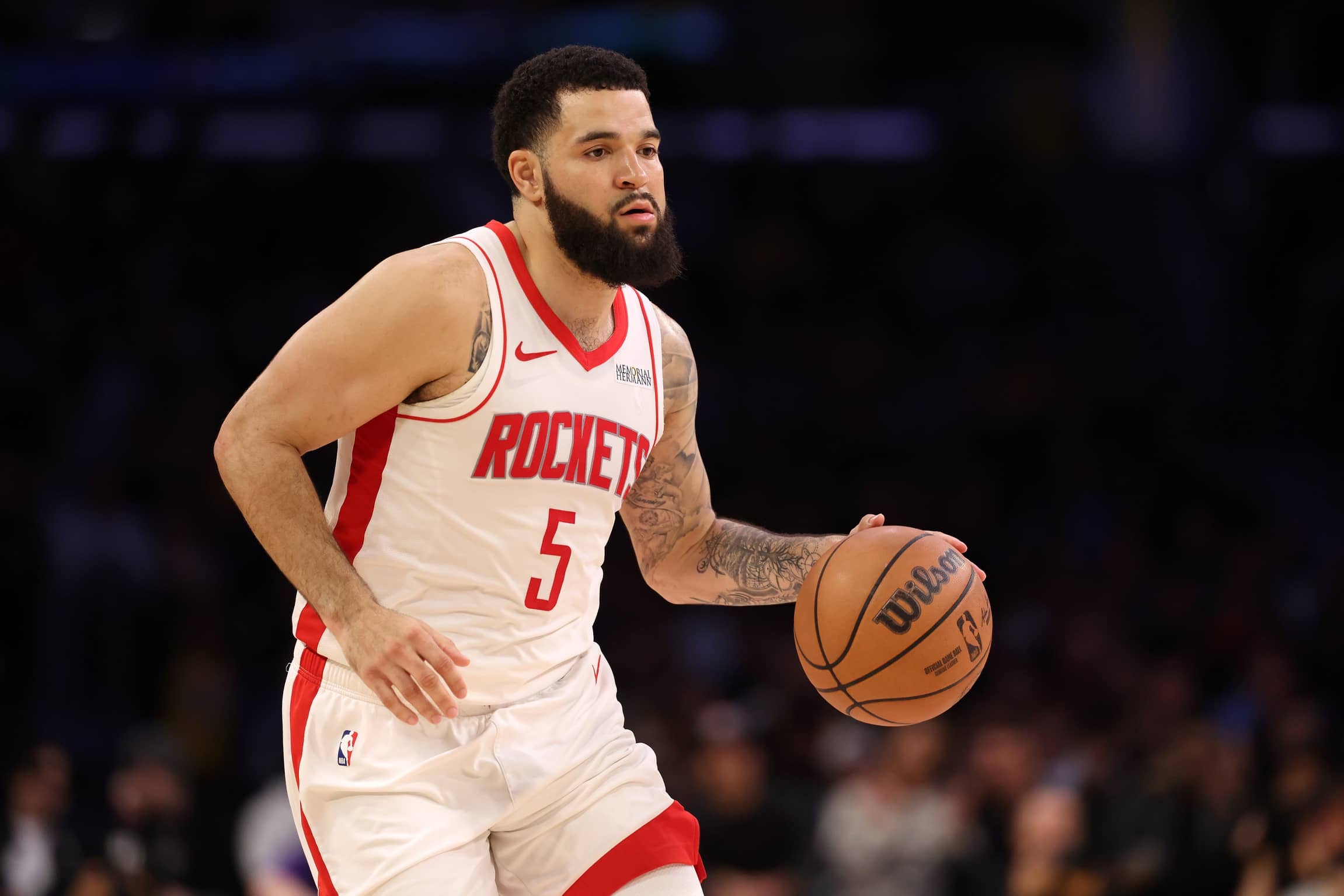 Los Angeles, California, USA; Houston Rockets guard Fred VanVleet (5) dribbles the ball during the third quarter against the Los Angeles Lakers at Crypto.com Arena.
