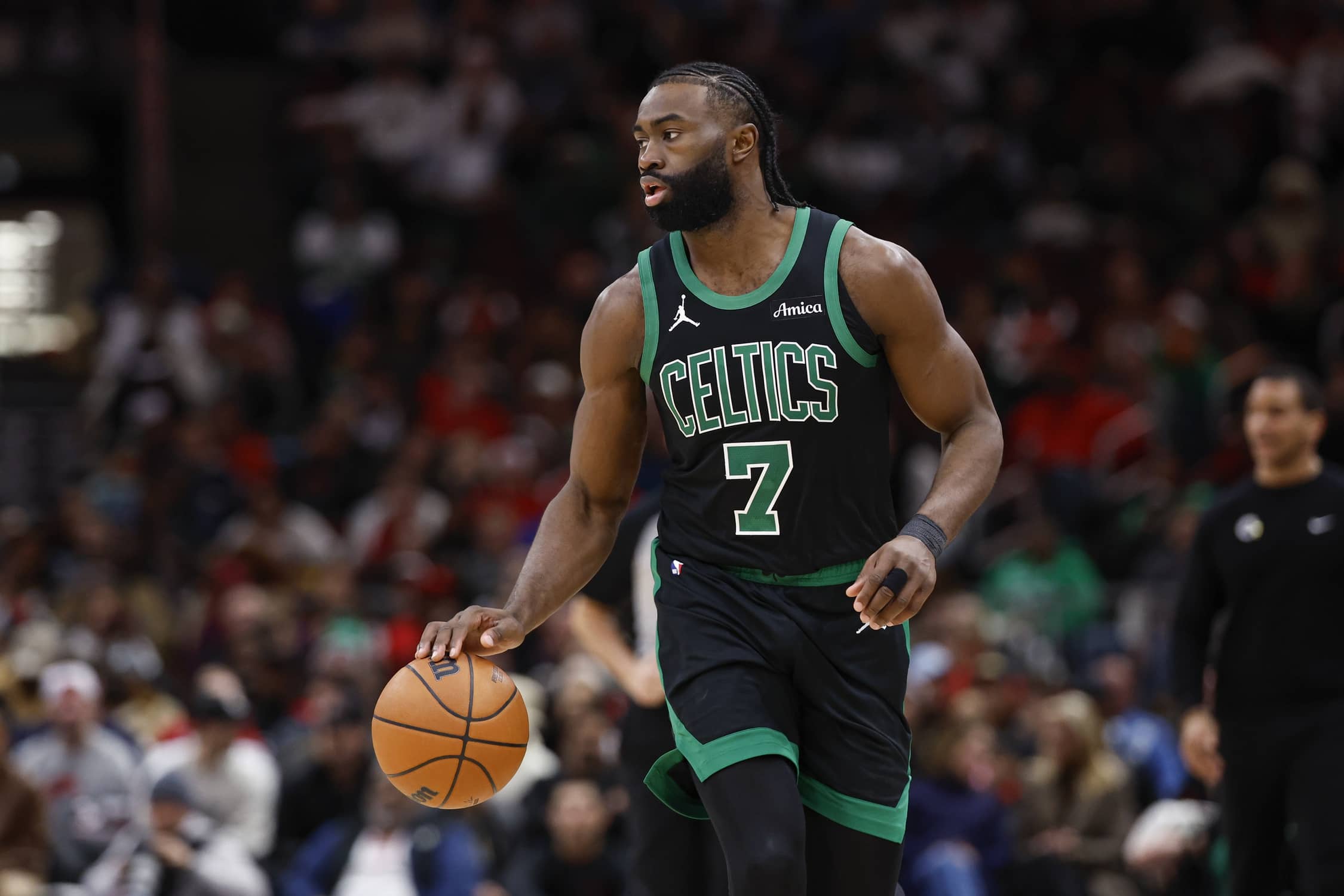Jaylen Brown brings the ball up the court during a game against the Chicago Bulls.