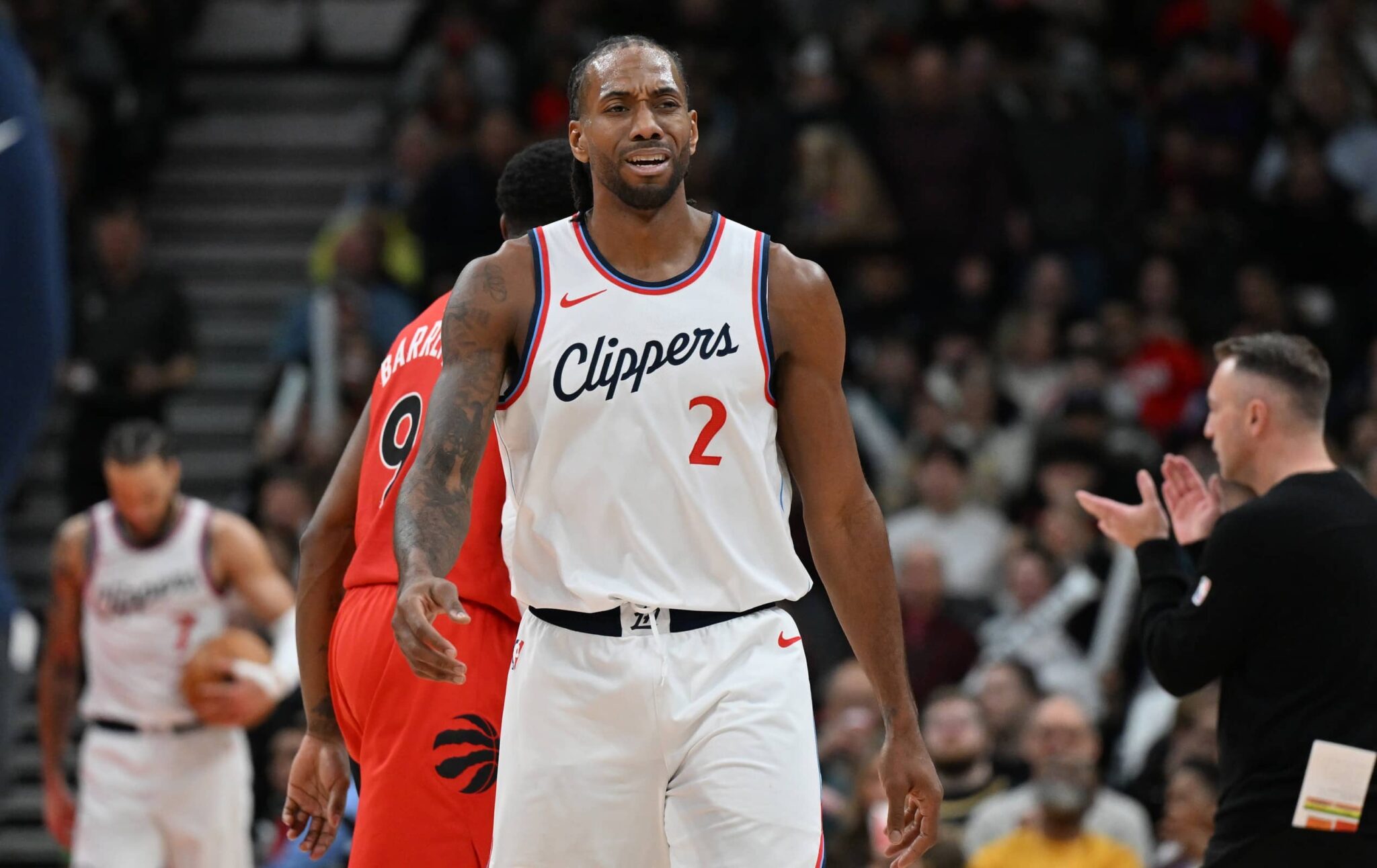 Toronto, Ontario, CAN; Los Angeles Clippers forward Kawhi Leonard (2) walks off the floor after time out was called in the second half against the Toronto Raptors at Scotiabank Arena. Mandatory Credit: Dan Hamilton-Imagn Images