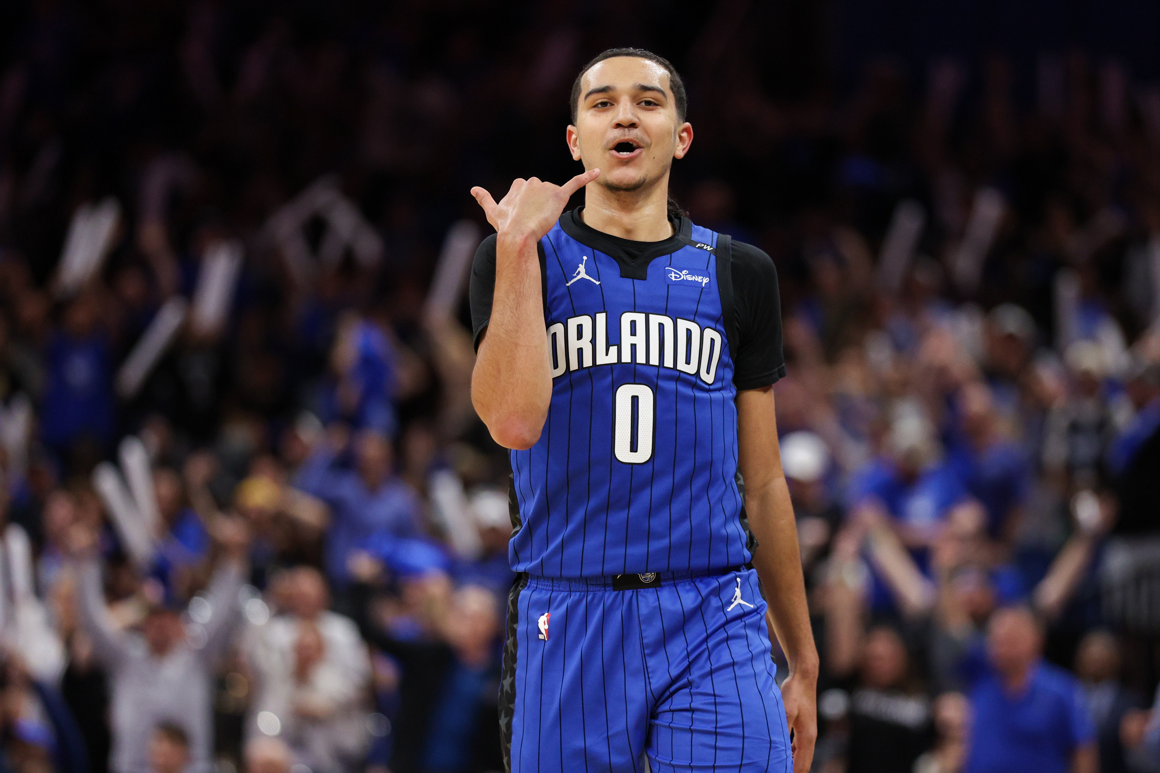 Apr 15, 2025; Orlando, Florida, USA; Orlando Magic guard Anthony Black (0) reacts after making a basket against the Atlanta Hawks in the fourth quarter at Kia Center. Mandatory Credit: Nathan Ray Seebeck-Imagn Images  