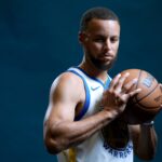 San Francisco, CA, USA; Golden State Warriors guard Stephen Curry (30) holds onto the ball during Media Day at the Chase Center. Mandatory Credit: Cary Edmondson-Imagn Images