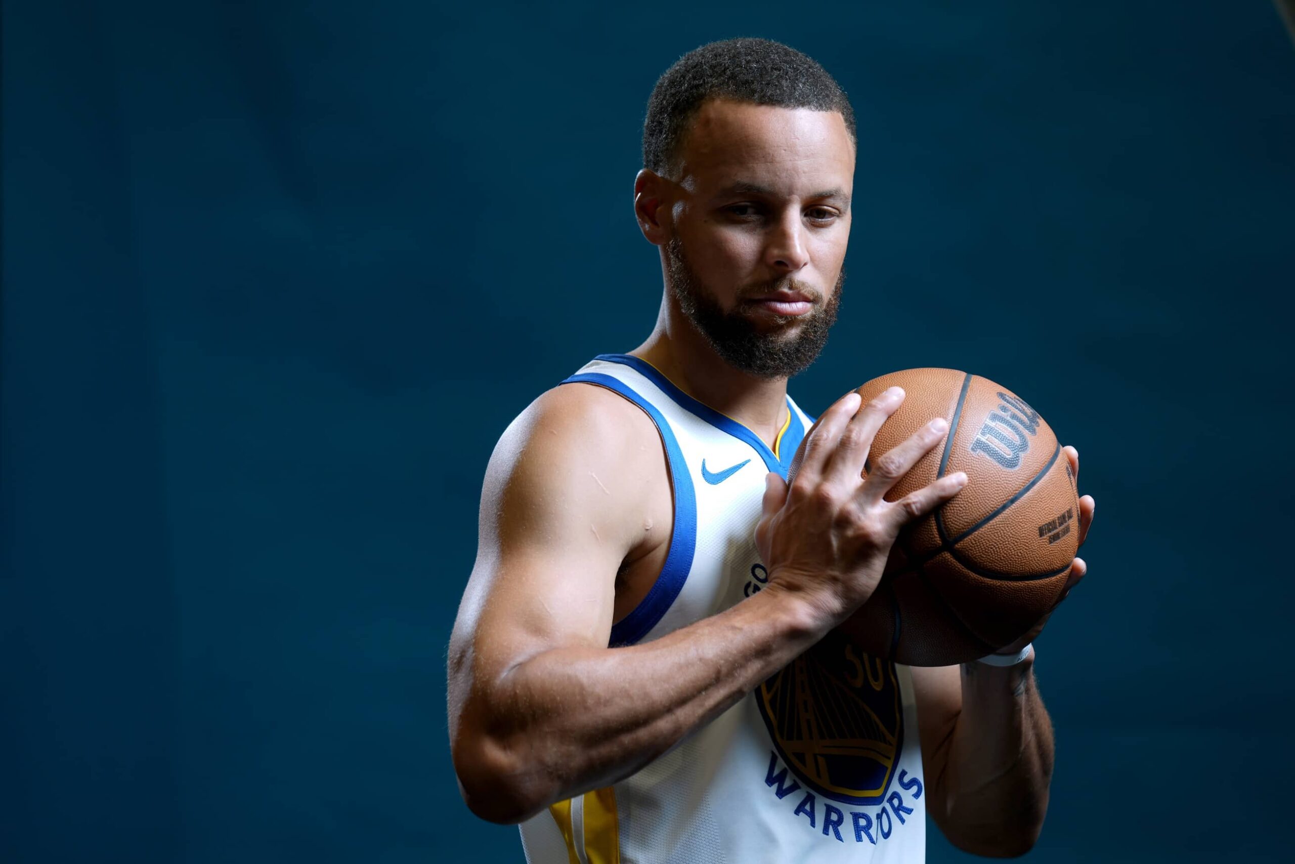 San Francisco, CA, USA; Golden State Warriors guard Stephen Curry (30) holds onto the ball during Media Day at the Chase Center. Mandatory Credit: Cary Edmondson-Imagn Images