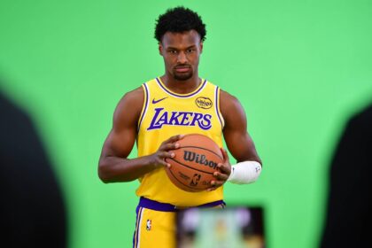Lakers guard Bronny James poses for photos during media day at UCLA Health Training Center