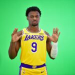 Lakers guard Bronny James poses for photos during media day at UCLA Health Training Center