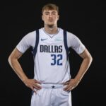 Mavericks forward Cooper Flagg poses for a photo during the Mavericks 2025 media day at the American Airlines Center