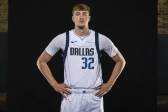 Mavericks forward Cooper Flagg poses for a photo during the Mavericks 2025 media day at the American Airlines Center