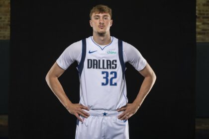 Mavericks forward Cooper Flagg poses for a photo during the Mavericks 2025 media day at the American Airlines Center