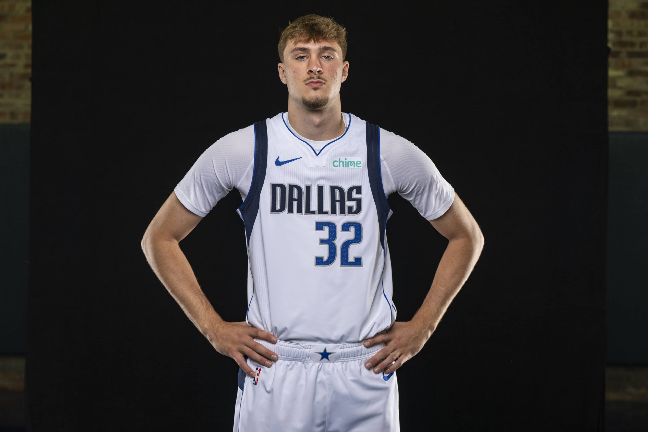 Mavericks forward Cooper Flagg poses for a photo during the Mavericks 2025 media day at the American Airlines Center