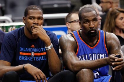 Jan 18, 2015; Orlando, FL, USA; Oklahoma City Thunder forward Kevin Durant (35) and center Kendrick Perkins (5) look on from the bench against the Orlando Magic during the second half at Amway Center. Oklahoma City Thunder defeated the Orlando Magic 127-99. Mandatory Credit: Kim Klement-Imagn Images