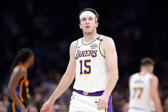 Oklahoma City, Oklahoma, USA; Los Angeles Lakers guard Austin Reaves (15) looks down court against the Oklahoma City Thunder during the second quarter at Paycom Center. Mandatory Credit: Alonzo Adams-Imagn Images