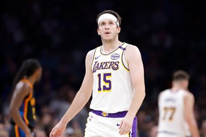 Oklahoma City, Oklahoma, USA; Los Angeles Lakers guard Austin Reaves (15) looks down court against the Oklahoma City Thunder during the second quarter at Paycom Center. Mandatory Credit: Alonzo Adams-Imagn Images
