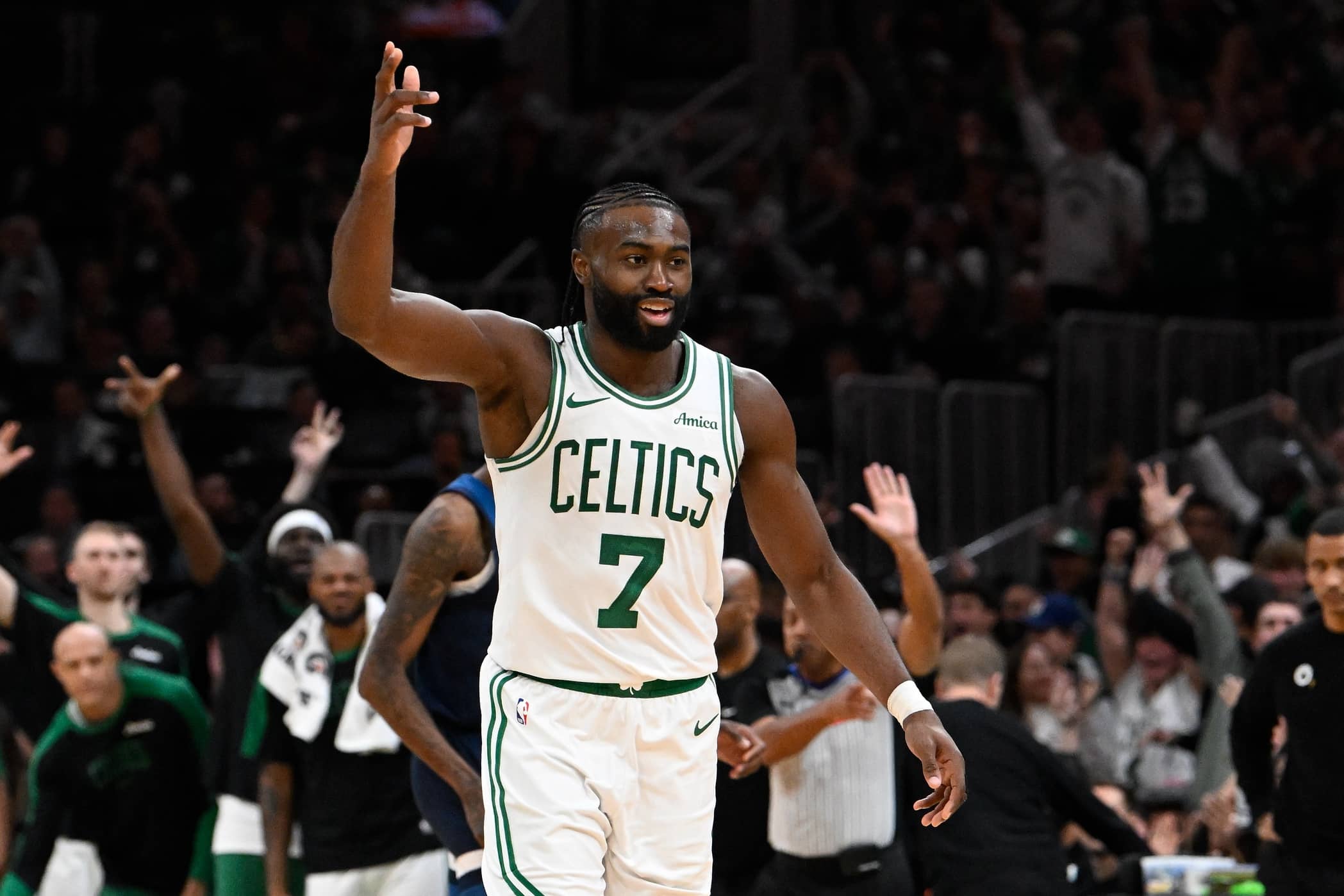 Celtics guard Jaylen Brown reacts to his three point basket against the Timberwolves during the second half at TD Garden. Mandatory Credit: Eric Canha-Imagn Images