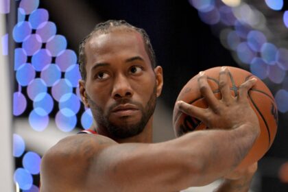 Clippers forward Kawhi Leonard poses during media day at Intuit Dome