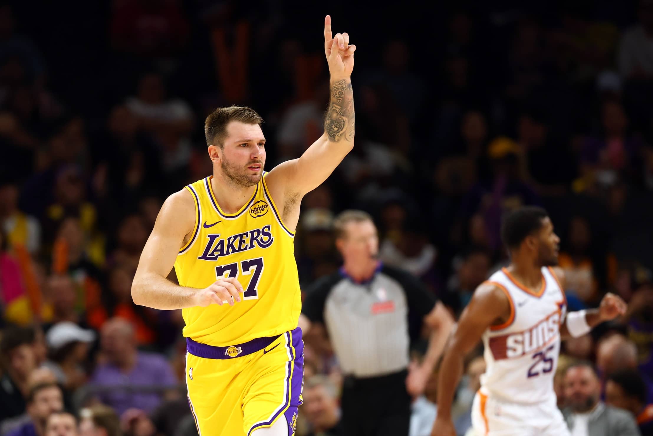 Lakers guard Luka Doncic reacts against the Suns during an NBA preseason game at Mortgage Matchup Center