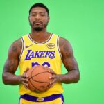 Lakers guard Marcus Smart poses for photos during media day at UCLA Health Training Center