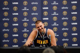 Nuggets player Nikola Jokic takes questions during media day at Ball Arena