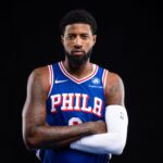 76ers Paul George poses for a photo during media day