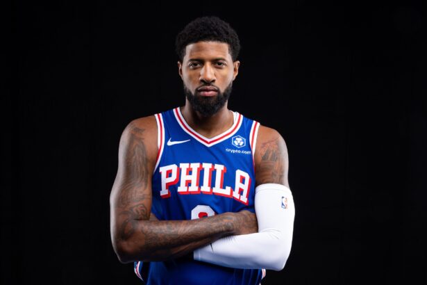 76ers Paul George poses for a photo during media day