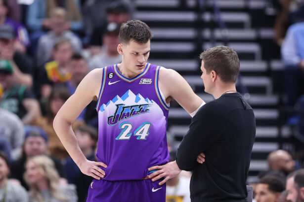 Mar 18, 2023; Salt Lake City, Utah, USA; Utah Jazz center Walker Kessler (24) and head coach Will Hardy speak during a break first quarter action against the Boston Celtics at Vivint Arena. Mandatory Credit: Rob Gray-Imagn Images