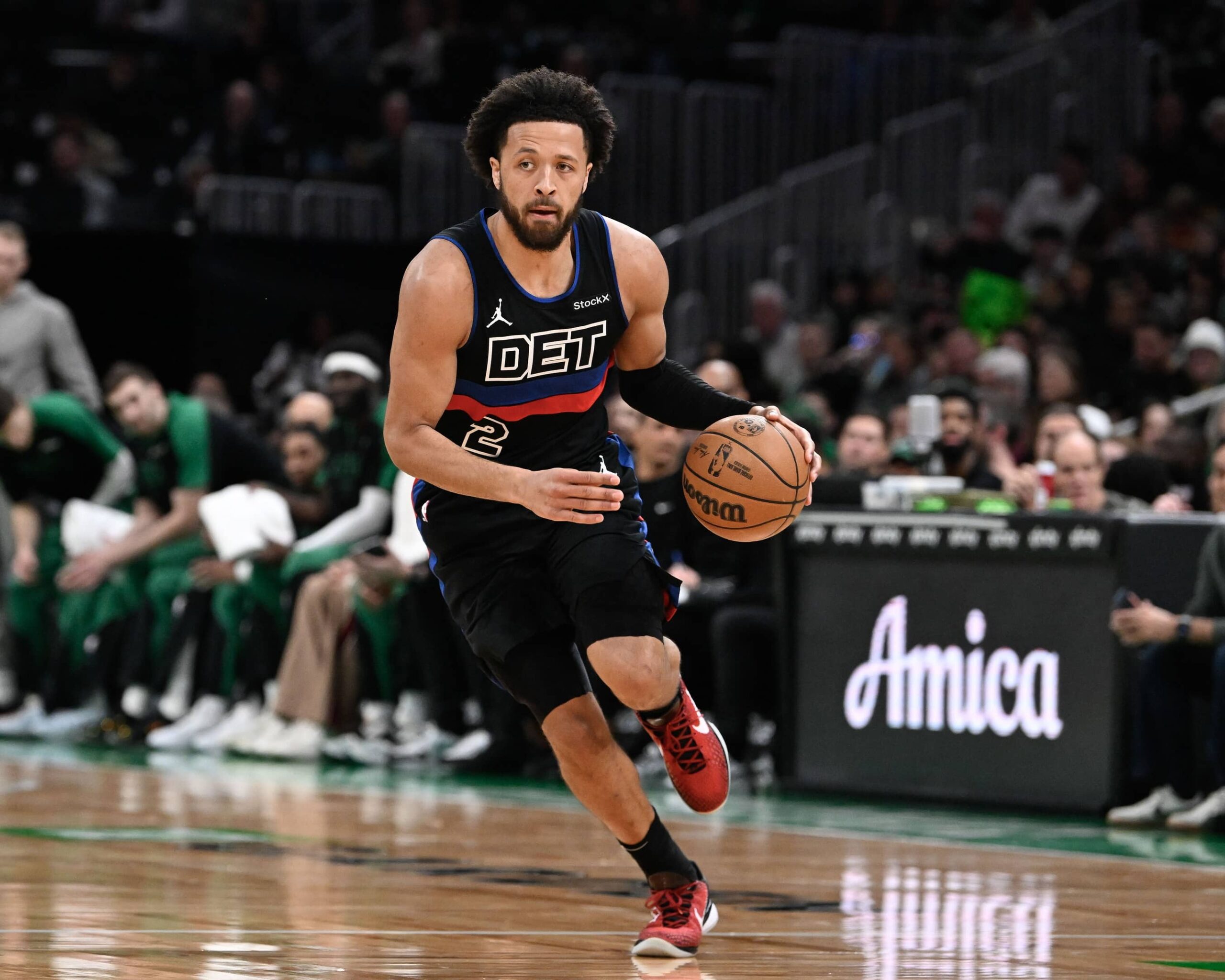 Boston, Massachusetts, USA; Detroit Pistons guard Cade Cunningham (2) dribbles against the Boston Celtics during the first half at TD Garden. Mandatory Credit: Eric Canha-Imagn Images