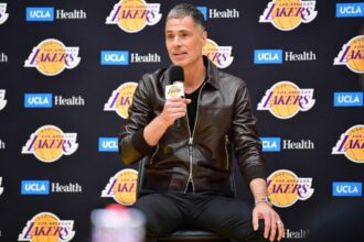Feb 4, 2025; El Segundo, CA, USA; Los Angeles Lakers vice president of basketball operations and general manager Rob Pelinka speaks before introducing Luka Doncic at UCLA Health Training Center. Mandatory Credit: Gary A. Vasquez-Imagn Images
