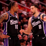 Mar 1, 2025; Houston, Texas, USA; Sacramento Kings forward DeMar DeRozan (10) talks with guard Zach LaVine (8) during a timeout against the Houston Rockets during the third quarter at Toyota Center. Mandatory Credit: Erik Williams-Imagn Images