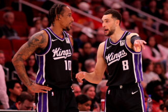 Mar 1, 2025; Houston, Texas, USA; Sacramento Kings forward DeMar DeRozan (10) talks with guard Zach LaVine (8) during a timeout against the Houston Rockets during the third quarter at Toyota Center. Mandatory Credit: Erik Williams-Imagn Images