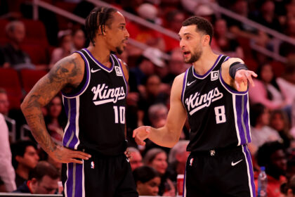 Mar 1, 2025; Houston, Texas, USA; Sacramento Kings forward DeMar DeRozan (10) talks with guard Zach LaVine (8) during a timeout against the Houston Rockets during the third quarter at Toyota Center. Mandatory Credit: Erik Williams-Imagn Images