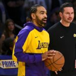 Mar 20, 2025; Los Angeles, California, USA; Los Angeles Lakers guard Gabe Vincent (7) talks with Los Angeles Lakers head coach JJ Redick before the game against the Milwaukee Bucksat Crypto.com Arena. Mandatory Credit: Jonathan Hui-Imagn Images