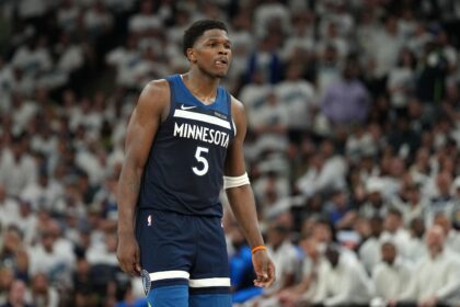 Minneapolis, Minnesota, USA; Minnesota Timberwolves guard Anthony Edwards (5) reacts against the Oklahoma City Thunder in the first half during Game 4 of the Western Conference Finals in the 2025 NBA Playoffs at Target Center. Mandatory Credit: Jesse Johnson-Imagn Images
