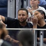 Aug 9, 2025; San Francisco, California, USA; Golden State Warriors star Stephen Curry and his wife Ayesha take in a Golden State Valkyries game against the Los Angeles Sparks at Chase Center. Mandatory Credit: D. Ross Cameron-Imagn Images