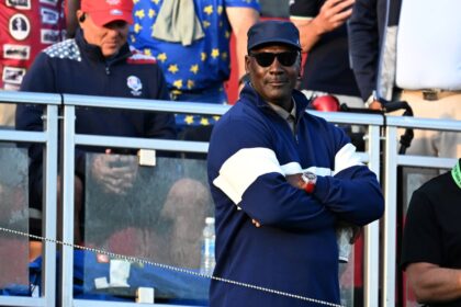 Sep 27, 2025; Bethpage, New York, USA; Michael Jordan watches the first hole on the penultimate day of competition for the Ryder Cup at Bethpage Black. Mandatory Credit: Dennis Schneidler-Imagn Images