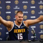 Sep 29, 2025; Denver, CO, USA; Denver Nuggets player Nikola Jokic (15) takes questions during media day at Ball Arena. Mandatory Credit: Isaiah J. Downing-Imagn Images