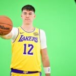 Sep 29, 2025; Los Angeles, CA, USA; Los Angeles Lakers forward Jake LaRavia (12) during media day at UCLA Health Training Center. Mandatory Credit: Gary A. Vasquez-Imagn Images