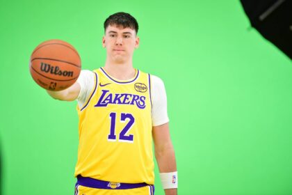 Sep 29, 2025; Los Angeles, CA, USA; Los Angeles Lakers forward Jake LaRavia (12) during media day at UCLA Health Training Center. Mandatory Credit: Gary A. Vasquez-Imagn Images